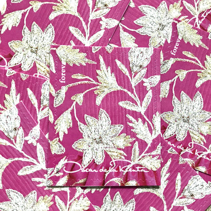 Oscar de la Renta Pink Floral Fabric postage stamps from 2017 featuring a pink, white and gray floral pattern on unused USPS Forever postage, Scott 5173j.