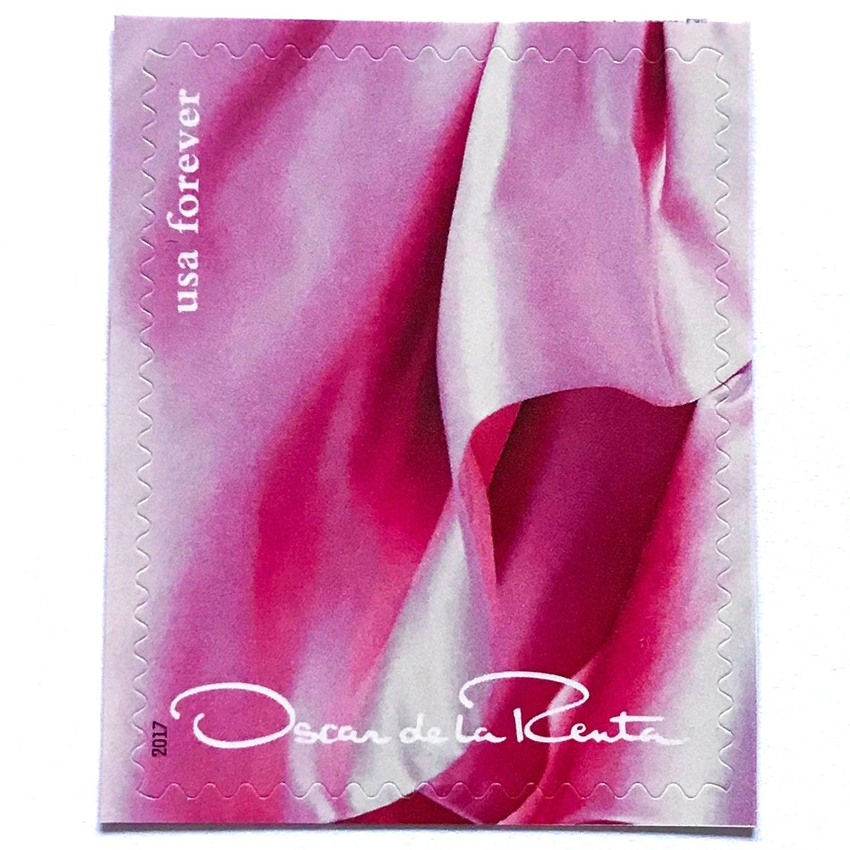 Oscar de la Renta Pink Dress postage stamp from 2017 featuring a pink couture dress on unused USPS Forever postage, Scott 5173k.