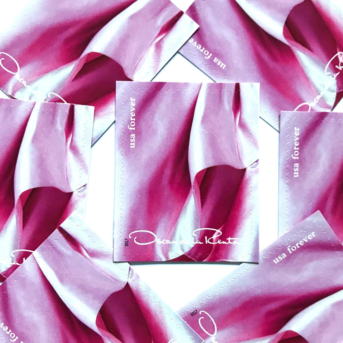 Oscar de la Renta Pink Dress postage stamps from 2017 featuring a pink couture dress on unused USPS Forever postage, Scott 5173k.