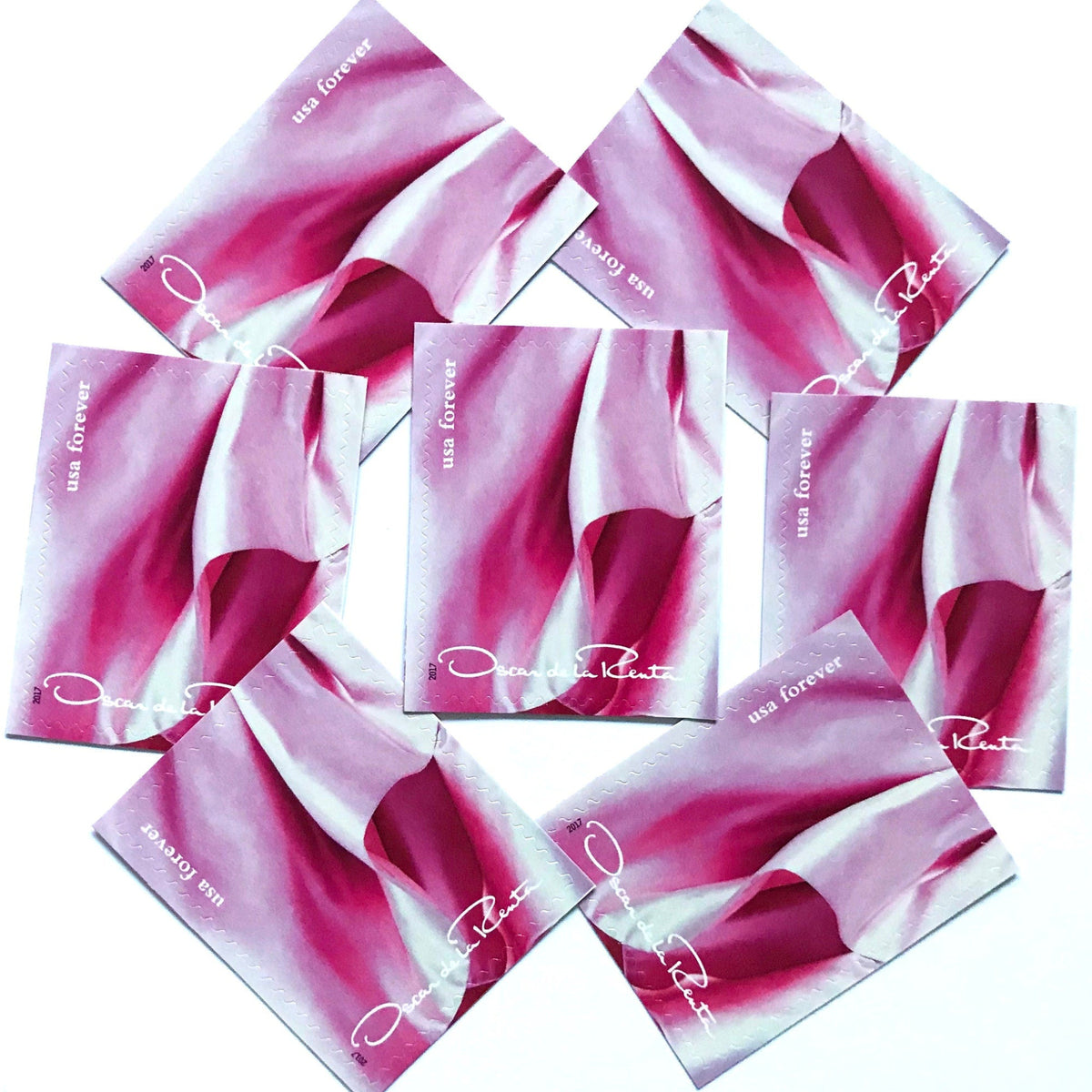Oscar de la Renta Pink Dress postage stamps from 2017 featuring a pink couture dress on unused USPS Forever postage, Scott 5173k.