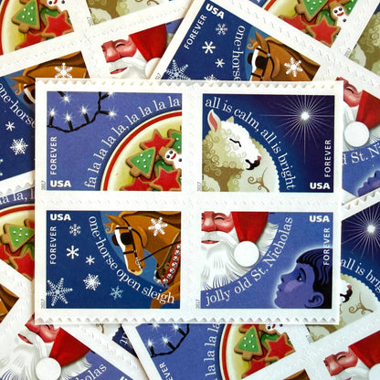 Christmas Carols four-stamp set from 2017 featuring Deck the Halls, Silent Night, Jingle Bells, and Jolly Old Saint Nicholas on unused USPS Forever postage, Scott 5247 to 5250.