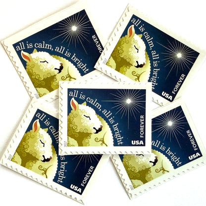 Silent Night postage stamps from 2017 featuring a sheep beneath a peaceful evening sky inspired by the classic Christmas carol on unused USPS Forever postage, Scott 5248.