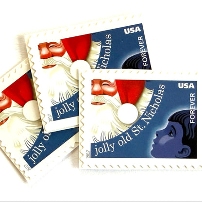 Jolly Old Saint Nicholas postage stamps from 2017 featuring Santa Claus with a child inspired by the traditional Christmas carol on unused USPS Forever postage, Scott 5250.
