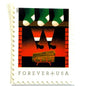 Santa Descending Chimney postage stamp from 2021 featuring St. Nick’s black-booted legs above a red-brick fireplace with green stockings on unused USPS Forever postage, Scott 5645.