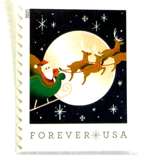 Santa Claus, Sleigh, and Reindeer in Flight postage stamps from 2021 featuring St. Nick and four reindeer flying across a full moon in a dark star-filled sky on unused USPS Forever postage, Scott 5647.