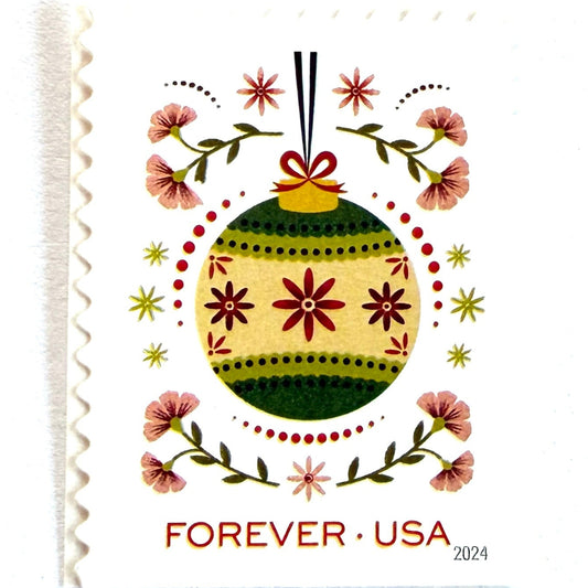 Green Round Ornament and Pink Flowers Holiday Joy postage stamp from 2024 featuring a colorful folk-art-inspired Christmas ornament on unused USPS Forever postage, Scott 5943.