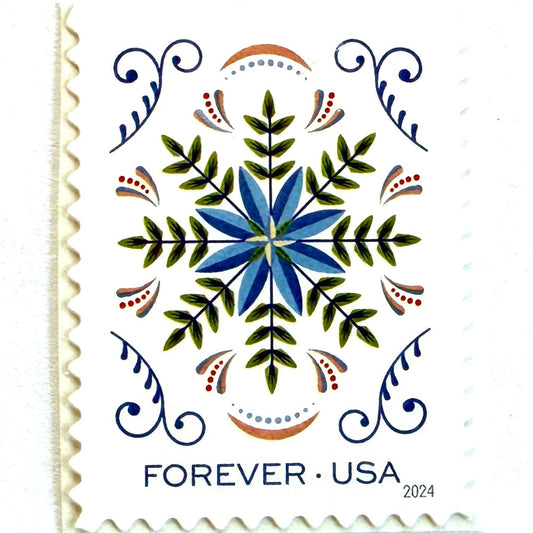 Blue Flower with Green Leaves Holiday Joy postage stamp from 2024 featuring a stylized folk-art floral design with decorative scrollwork on unused USPS Forever postage, Scott 5944.