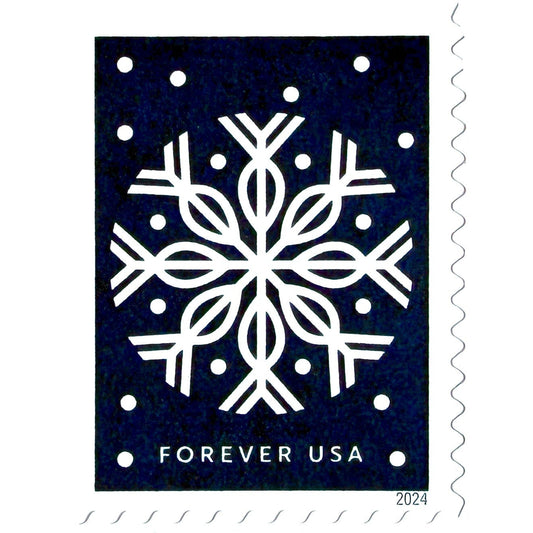 Dark blue Winter Whimsy Snowflake postage stamp from 2024 featuring a white symmetrical paper-cut-inspired winter design on unused USPS Forever postage, Scott 5948.