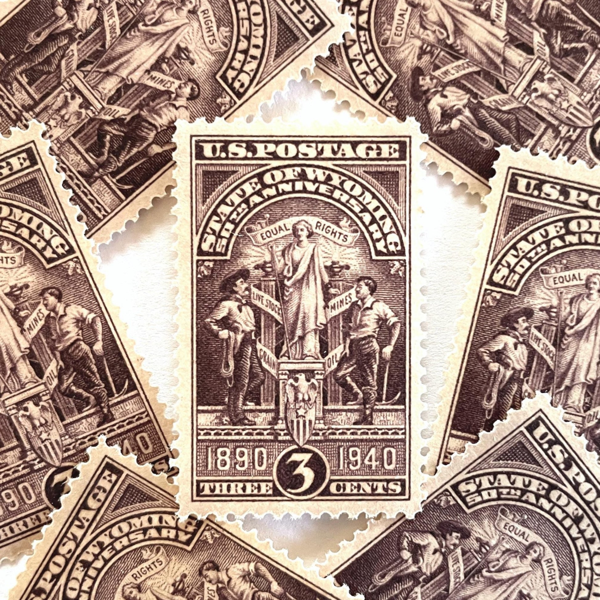 Image of Wyoming Statehood postage stamps from 1940, featuring the Wyoming state seal in brown on vintage unused 3-cent USPS postage, Scott 897.