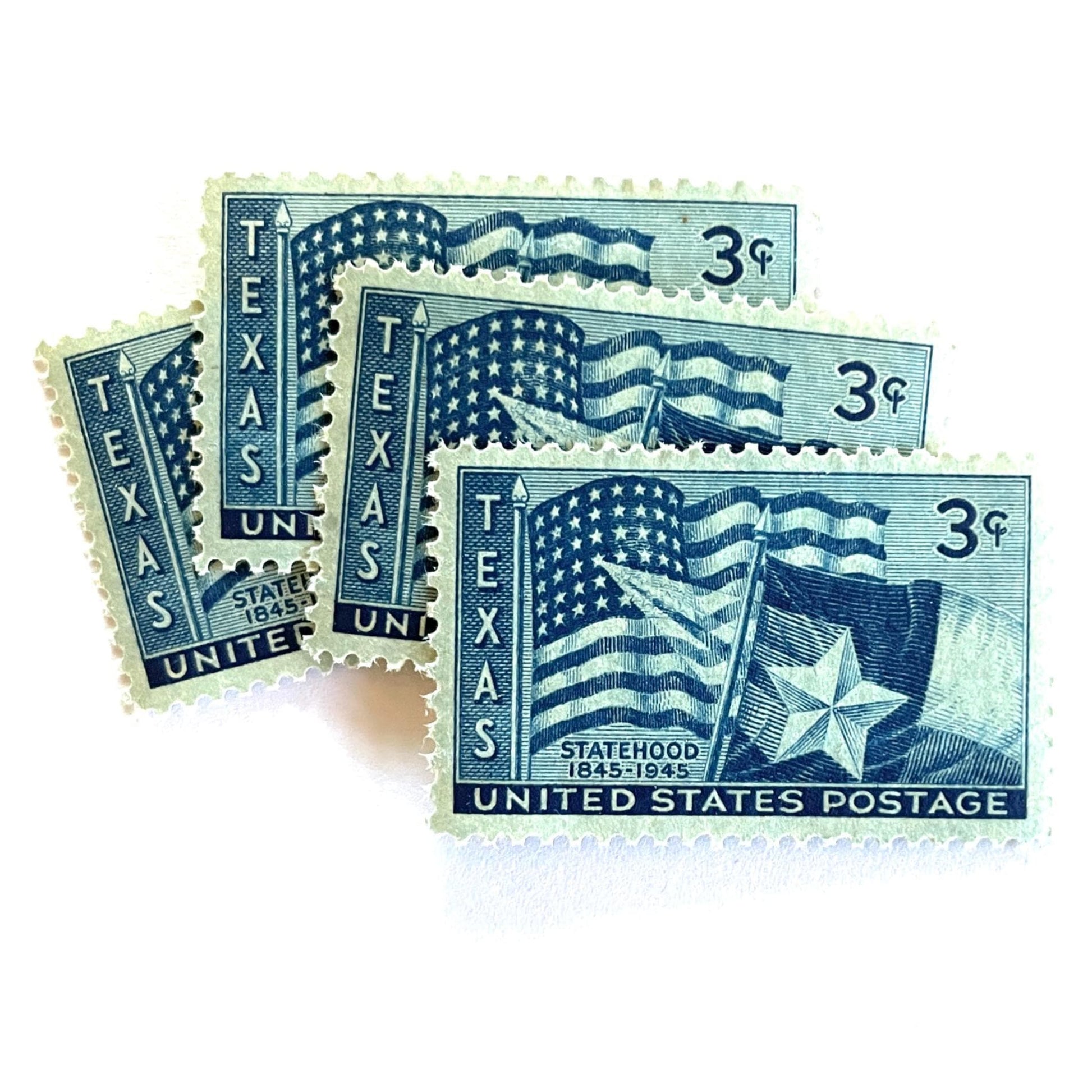 Image of 1945 Texas Statehood 3-cent dark blue postage stamps. Scott #938. Stamp themes: Texas, Lone Star State, Texas flag, U.S. flag, patriotic, statehood centennial, American history.