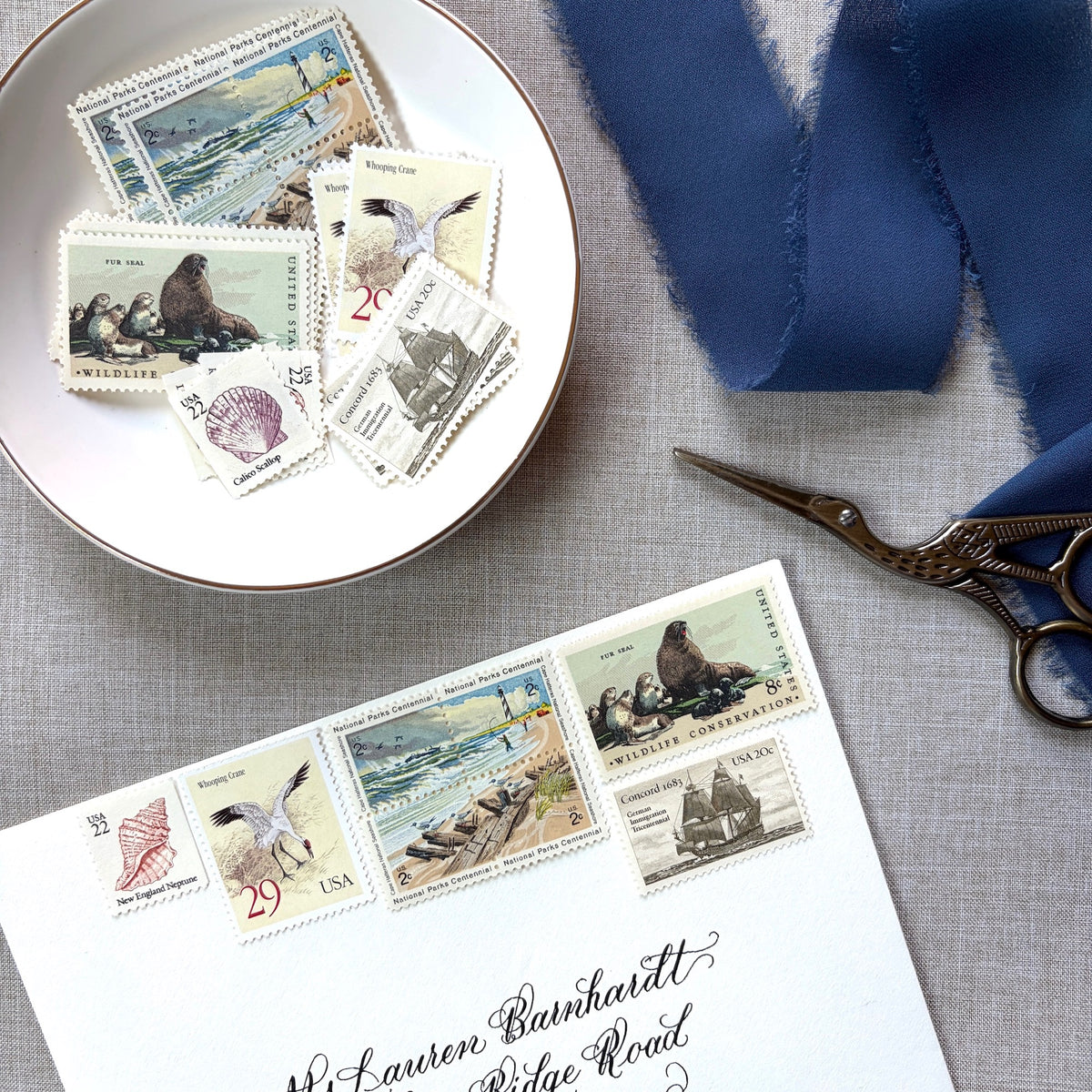 Unused vintage beach stamp set for mailing beach, nautical, coastal, and marine-themed save-the-dates, wedding invitations, bridal shower invitations, and other special correspondence. Each curated set is comprised of eight unused stamps with a total USPS postage value of 87 cents — enough postage to mail a standard rectangular envelope that weighs up to one ounce.