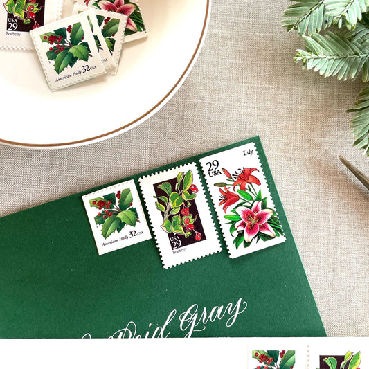 Unused “Botanical Christmas” vintage postage stamp set perfect for adding a special touch to your holiday cards or letters! Each curated set is comprised of three (3) unused stamps with a total USPS postage value of $0.90 (USD) per set — enough postage to mail a standard letter weighing up to 1-ounce.