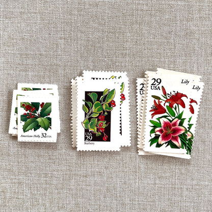 Unused “Botanical Christmas” vintage postage stamp set perfect for adding a special touch to your holiday cards or letters! Each curated set is comprised of three (3) unused stamps with a total USPS postage value of $0.90 (USD) per set — enough postage to mail a standard letter weighing up to 1-ounce.