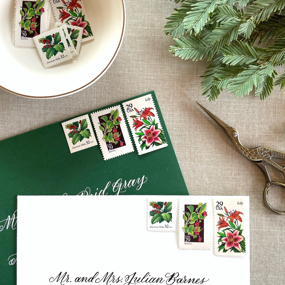 Unused “Botanical Christmas” vintage postage stamp set perfect for adding a special touch to your holiday cards or letters! Each curated set is comprised of three (3) unused stamps with a total USPS postage value of $0.90 (USD) per set — enough postage to mail a standard letter weighing up to 1-ounce.