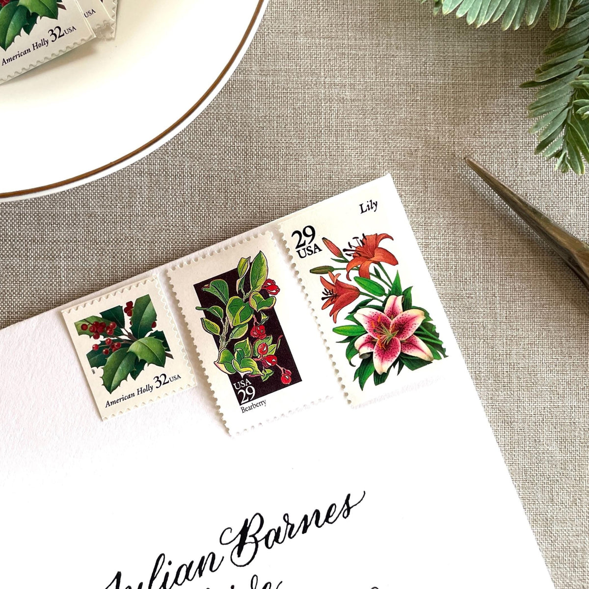Unused “Botanical Christmas” vintage postage stamp set perfect for adding a special touch to your holiday cards or letters! Each curated set is comprised of three (3) unused stamps with a total USPS postage value of $0.90 (USD) per set — enough postage to mail a standard letter weighing up to 1-ounce.