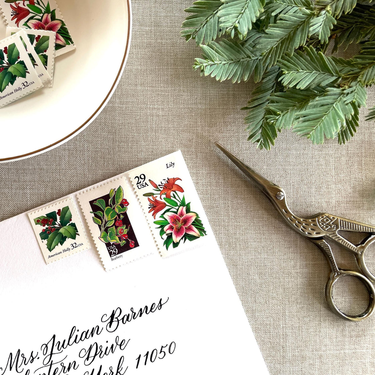 Unused “Botanical Christmas” vintage postage stamp set perfect for adding a special touch to your holiday cards or letters! Each curated set is comprised of three (3) unused stamps with a total USPS postage value of $0.90 (USD) per set — enough postage to mail a standard letter weighing up to 1-ounce.