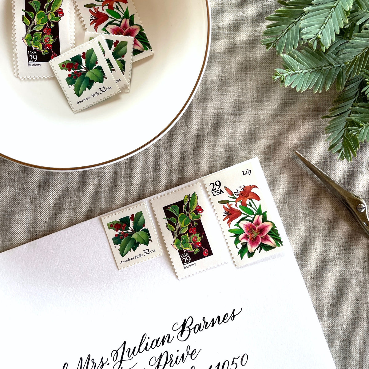 Unused “Botanical Christmas” vintage postage stamp set perfect for adding a special touch to your holiday cards or letters! Each curated set is comprised of three (3) unused stamps with a total USPS postage value of $0.90 (USD) per set — enough postage to mail a standard letter weighing up to 1-ounce.