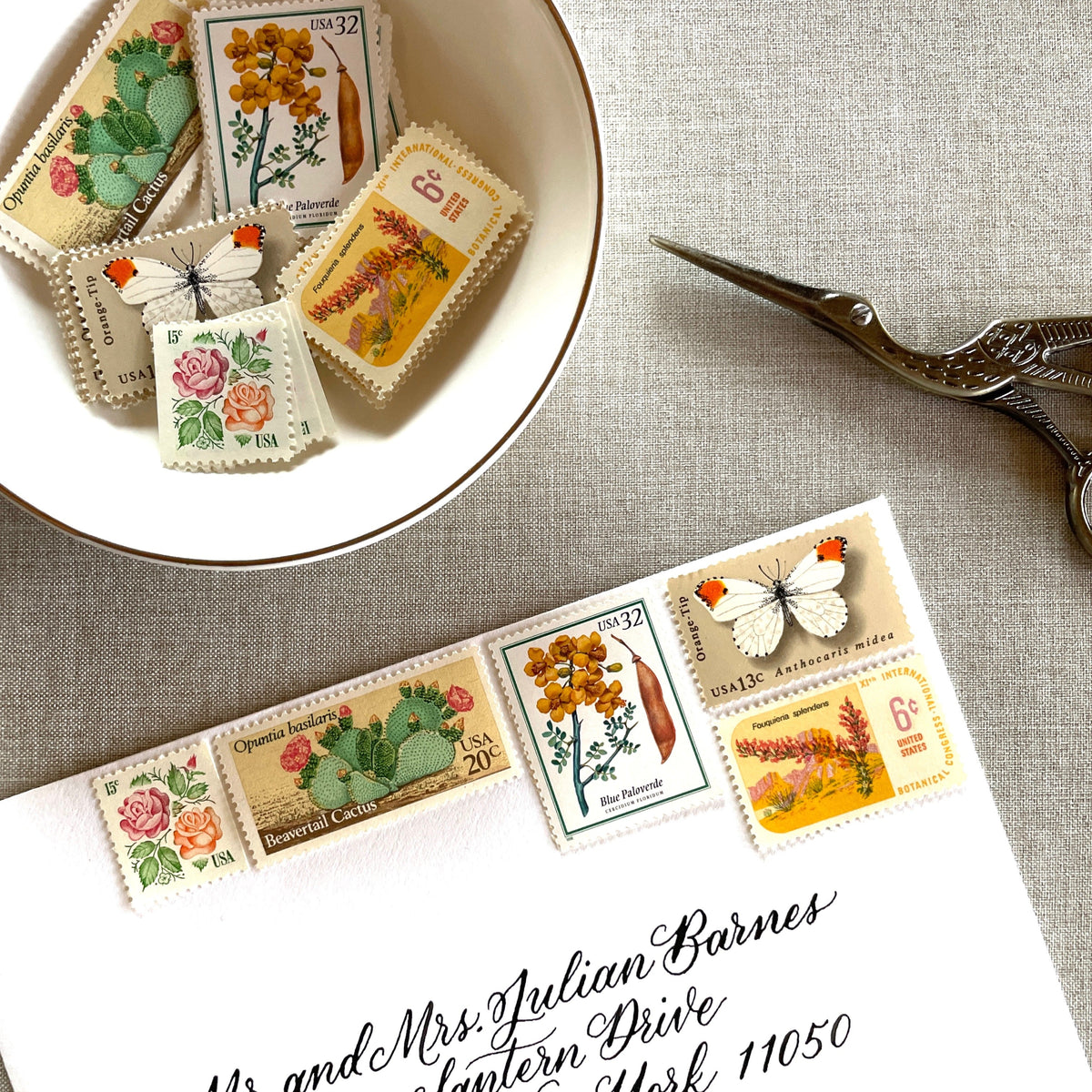 Vintage desert postage stamp set featuring Medallion Rose, Beavertail Cactus, Paloverde, Orange-Tip Butterfly, and Ocotillo unused U.S. stamps for Southwest wedding invitations and save-the-dates.