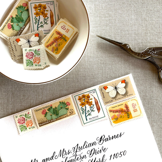 Vintage desert postage stamp set featuring Medallion Rose, Beavertail Cactus, Paloverde, Orange-Tip Butterfly, and Ocotillo unused U.S. stamps for Southwest wedding invitations and save-the-dates.