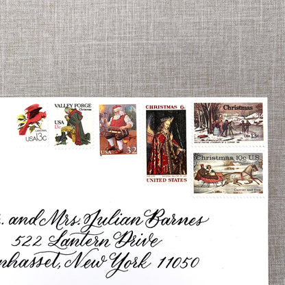 Unused vintage stamp set perfect for adding a special touch to your holiday cards or letters! Each curated set is comprised of six (6) unused stamps with a total USPS postage value of $0.87 per set — enough postage to mail a standard letter weighing up to 1-ounce.