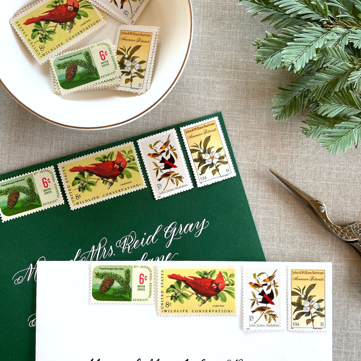 Unused “Gold Botanical Christmas” vintage postage stamp set perfect for adding a special touch to your holiday cards or letters! Each curated set is comprised of four (4) unused stamps with a total USPS postage value of $0.84 (USD) per set — enough postage to mail a standard letter weighing up to 1-ounce.