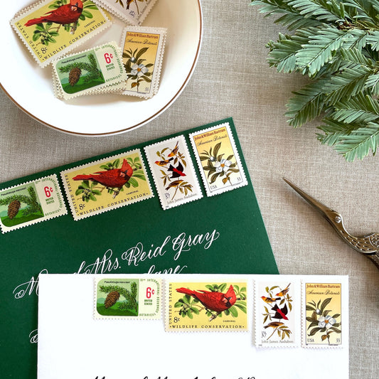Unused “Gold Botanical Christmas” vintage postage stamp set perfect for adding a special touch to your holiday cards or letters! Each curated set is comprised of four (4) unused stamps with a total USPS postage value of $0.84 (USD) per set — enough postage to mail a standard letter weighing up to 1-ounce.