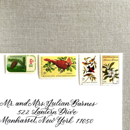 Unused “Gold Botanical Christmas” vintage postage stamp set perfect for adding a special touch to your holiday cards or letters! Each curated set is comprised of four (4) unused stamps with a total USPS postage value of $0.84 (USD) per set — enough postage to mail a standard letter weighing up to 1-ounce.