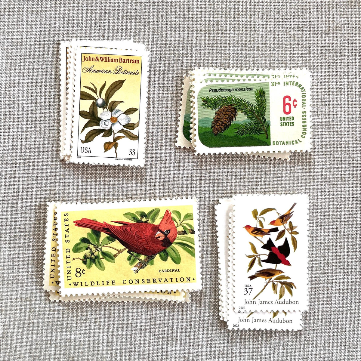 Unused “Gold Botanical Christmas” vintage postage stamp set perfect for adding a special touch to your holiday cards or letters! Each curated set is comprised of four (4) unused stamps with a total USPS postage value of $0.84 (USD) per set — enough postage to mail a standard letter weighing up to 1-ounce.