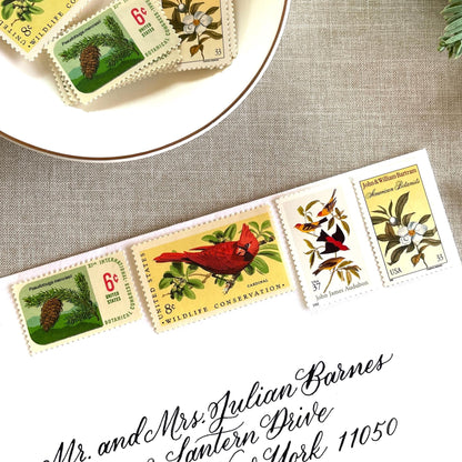 Unused “Gold Botanical Christmas” vintage postage stamp set perfect for adding a special touch to your holiday cards or letters! Each curated set is comprised of four (4) unused stamps with a total USPS postage value of $0.84 (USD) per set — enough postage to mail a standard letter weighing up to 1-ounce.