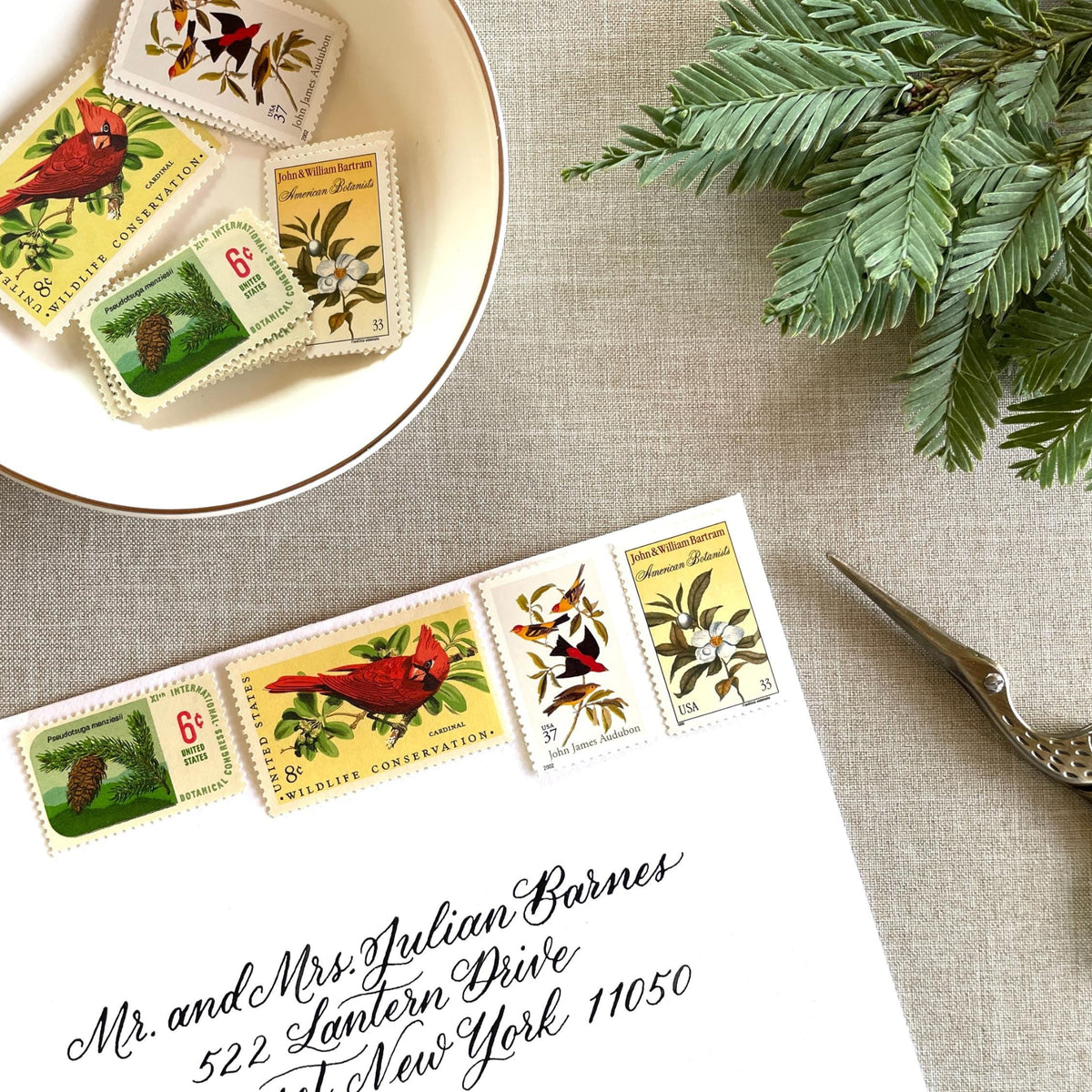 Unused “Gold Botanical Christmas” vintage postage stamp set perfect for adding a special touch to your holiday cards or letters! Each curated set is comprised of four (4) unused stamps with a total USPS postage value of $0.84 (USD) per set — enough postage to mail a standard letter weighing up to 1-ounce.