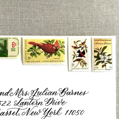 Unused “Gold Botanical Christmas” vintage postage stamp set perfect for adding a special touch to your holiday cards or letters! Each curated set is comprised of four (4) unused stamps with a total USPS postage value of $0.84 (USD) per set — enough postage to mail a standard letter weighing up to 1-ounce.