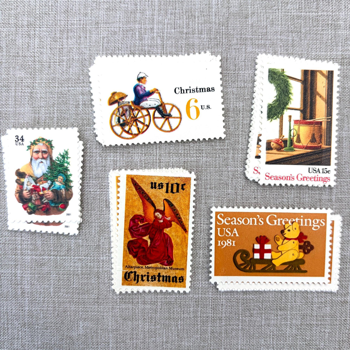 Unused “Gold Santa Christmas” vintage postage stamp set perfect for adding a special touch to your holiday cards or letters! Each curated set is comprised of five (5) unused stamps with a total USPS postage value of $0.85 (USD) per set — enough postage to mail a standard letter weighing up to 1-ounce.