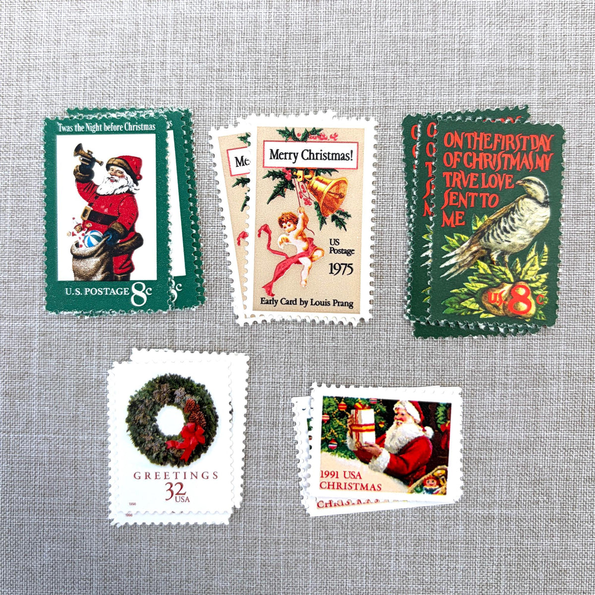 Unused “Green Wreath Christmas” vintage postage stamp set perfect for adding a special touch to your holiday cards or letters! Each curated set is comprised of five (5) unused stamps with a total USPS postage value of $0.87 (USD) per set — enough postage to mail a standard letter weighing up to 1-ounce.
