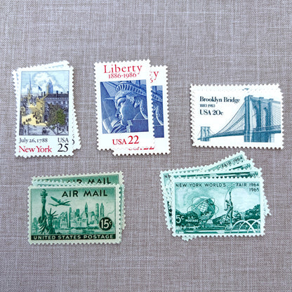 Unused vintage stamp set perfect for mailing New York or NYC-themed wedding invitations, save-the-dates, engagement announcements, bridal shower invites, thank you notes, or other special correspondence. Each curated set is comprised of five unused stamps with a total USPS postage value of 87 cents, enough postage to mail a standard letter weighing up to 1 ounce. These unused U.S. stamps are perfectly valid for use as postage.