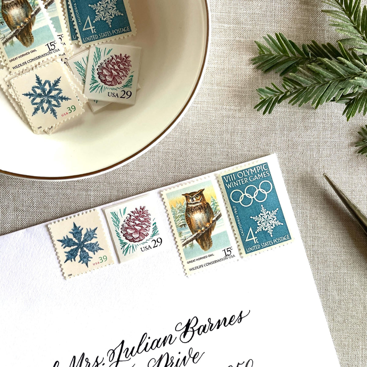 Unused “Owl + Snowflake Christmas” vintage postage stamp set perfect for adding a special touch to your holiday cards or letters! Each curated set is comprised of four (4) unused stamps with a total USPS postage value of $0.87 (USD) per set — enough postage to mail a standard letter weighing up to 1-ounce.