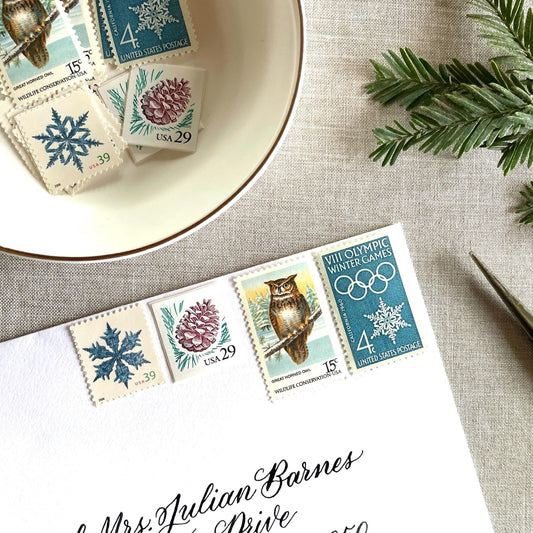 Unused “Owl + Snowflake Christmas” vintage postage stamp set perfect for adding a special touch to your holiday cards or letters! Each curated set is comprised of four (4) unused stamps with a total USPS postage value of $0.87 (USD) per set — enough postage to mail a standard letter weighing up to 1-ounce.
