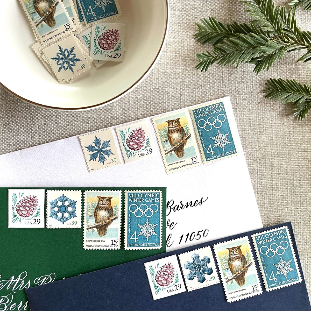 Unused “Owl + Snowflake Christmas” vintage postage stamp set perfect for adding a special touch to your holiday cards or letters! Each curated set is comprised of four (4) unused stamps with a total USPS postage value of $0.87 (USD) per set — enough postage to mail a standard letter weighing up to 1-ounce.