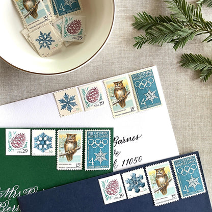 Unused “Owl + Snowflake Christmas” vintage postage stamp set perfect for adding a special touch to your holiday cards or letters! Each curated set is comprised of four (4) unused stamps with a total USPS postage value of $0.87 (USD) per set — enough postage to mail a standard letter weighing up to 1-ounce.