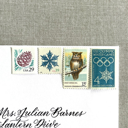 Unused “Owl + Snowflake Christmas” vintage postage stamp set perfect for adding a special touch to your holiday cards or letters! Each curated set is comprised of four (4) unused stamps with a total USPS postage value of $0.87 (USD) per set — enough postage to mail a standard letter weighing up to 1-ounce.
