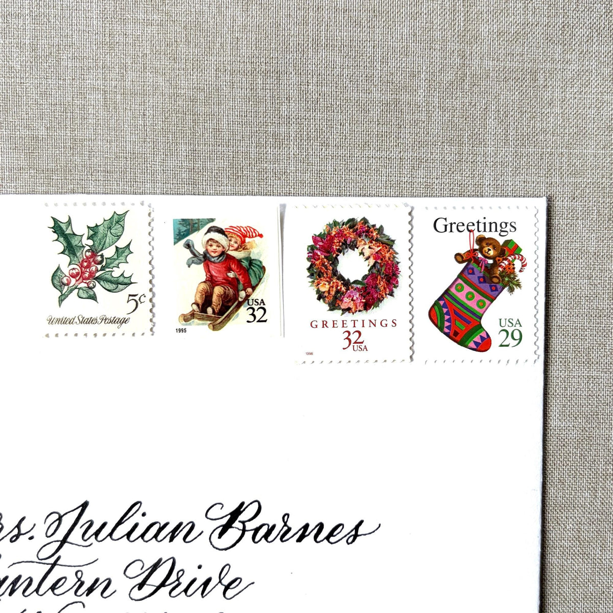 Unused Pink Christmas vintage stamp set perfect for adding a special touch to your holiday cards or letters! Each curated set is comprised of four (4) unused stamps with a total USPS postage value of $0.98 (USD) per set — enough postage to mail a standard letter weighing up to 1-ounce.