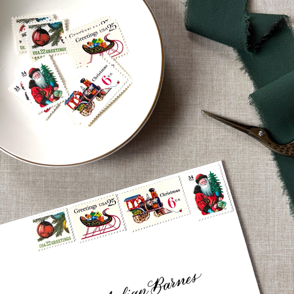 Unused “Red Train Christmas” vintage postage stamp set perfect for adding a special touch to your holiday cards or letters! Each curated set is comprised of four (4) unused stamps with a total USPS postage value of $0.87 (USD) per set — enough postage to mail a standard letter weighing up to 1-ounce.