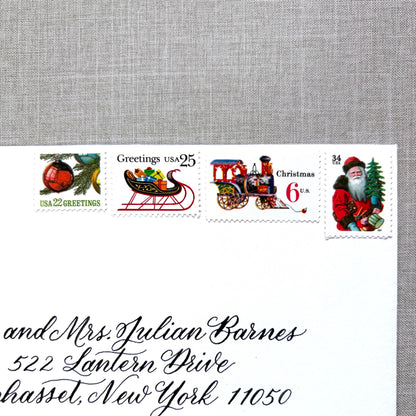 Unused “Red Train Christmas” vintage postage stamp set perfect for adding a special touch to your holiday cards or letters! Each curated set is comprised of four (4) unused stamps with a total USPS postage value of $0.87 (USD) per set — enough postage to mail a standard letter weighing up to 1-ounce.