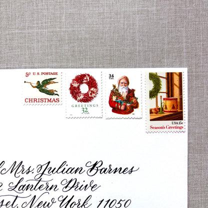 Unused Red Christmas Glow vintage postage stamp set perfect for adding a special touch to your holiday cards or letters! Each curated set is comprised of four (4) unused stamps with a total USPS postage value of $0.86 (USD) per set — enough postage to mail a standard letter weighing up to 1-ounce. 