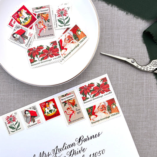 Unused vintage stamp set perfect for adding a special touch to your holiday cards or letters! Each curated set is comprised of six (6) unused stamps with a total USPS postage value of $0.85 per set — enough postage to mail a standard letter weighing up to 1-ounce. These U.S. stamps are perfectly valid for use as postage for mailing with USPS.