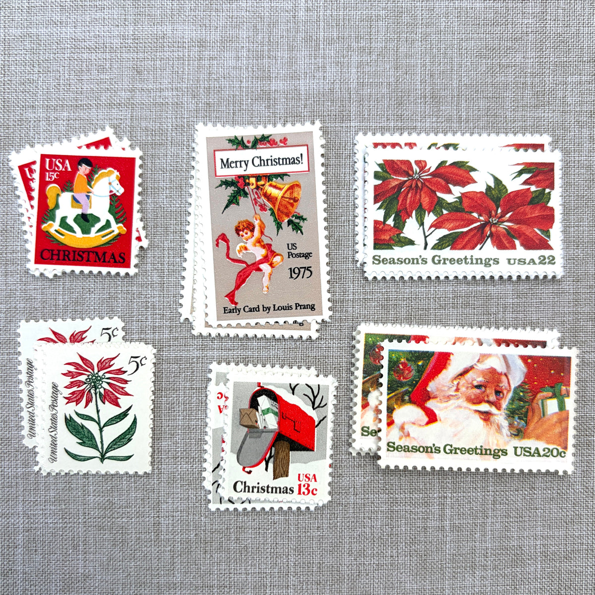 Unused vintage stamp set perfect for adding a special touch to your holiday cards or letters! Each curated set is comprised of six (6) unused stamps with a total USPS postage value of $0.85 per set — enough postage to mail a standard letter weighing up to 1-ounce. These U.S. stamps are perfectly valid for use as postage for mailing with USPS.